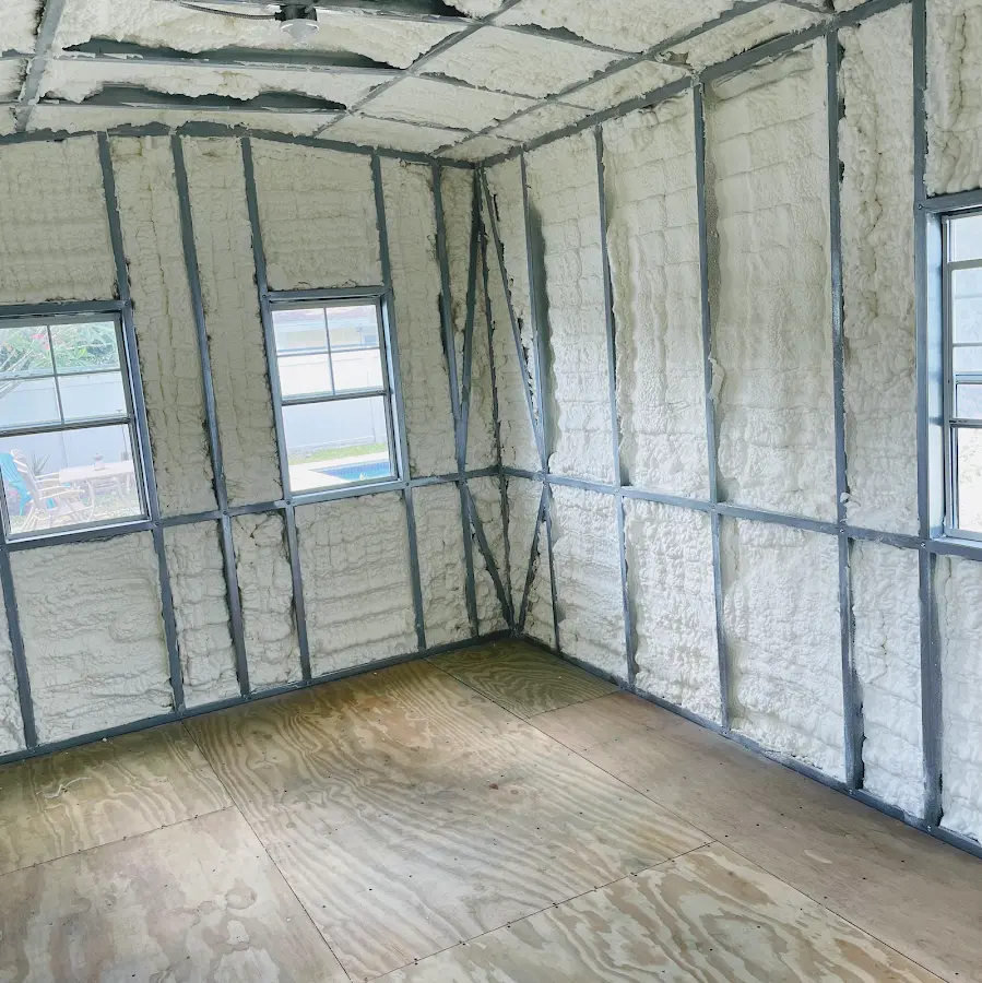 Closed-cell spray foam insulation applied to wall cavities in a residential project in South Laurel